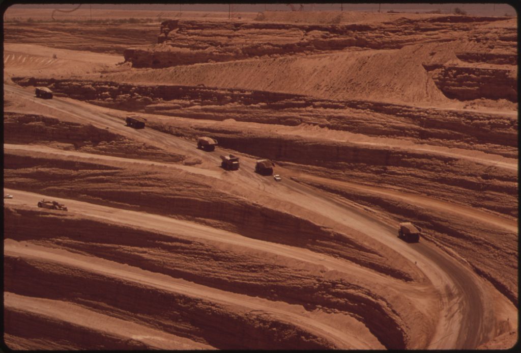 Aerial of open-pit mine haul roads across a large area